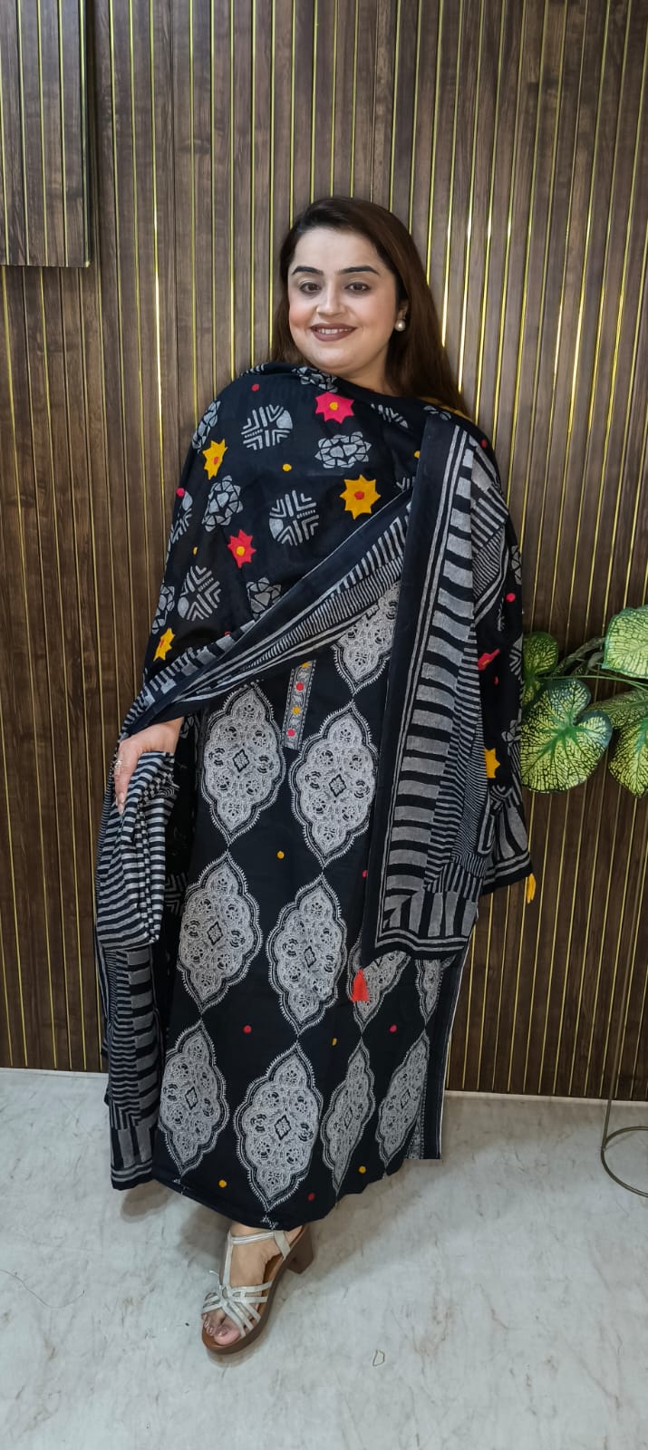 "Elegant Black Suit with Intricate Appliqué and Designer Dupatta